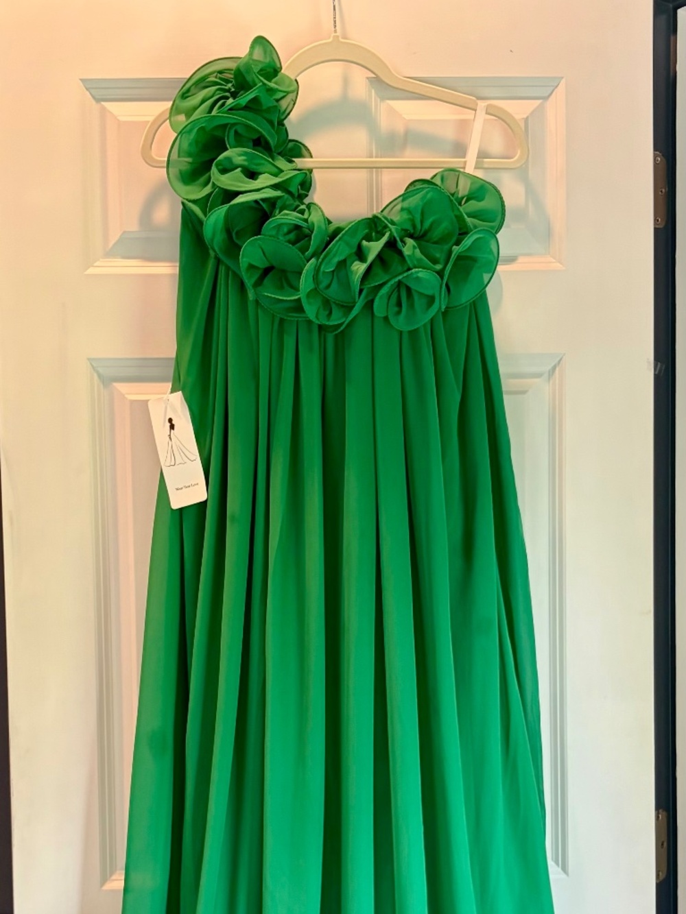 New, green flowy one shoulder floor length formal dress, with shoulder details